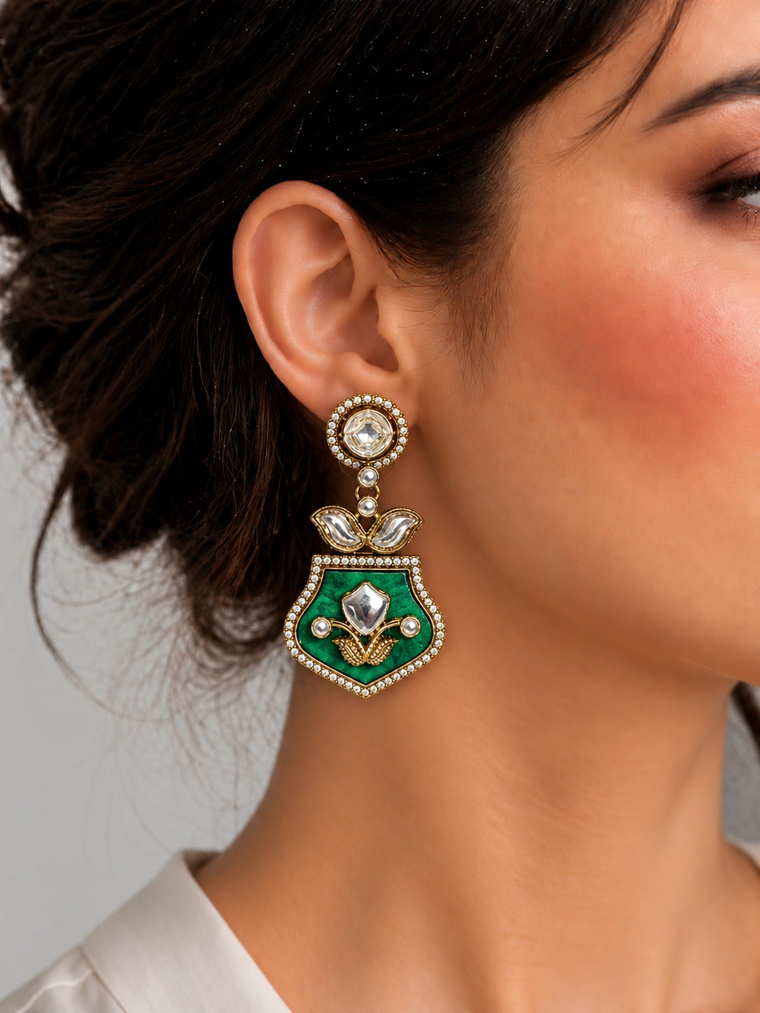 Designer stud earrings